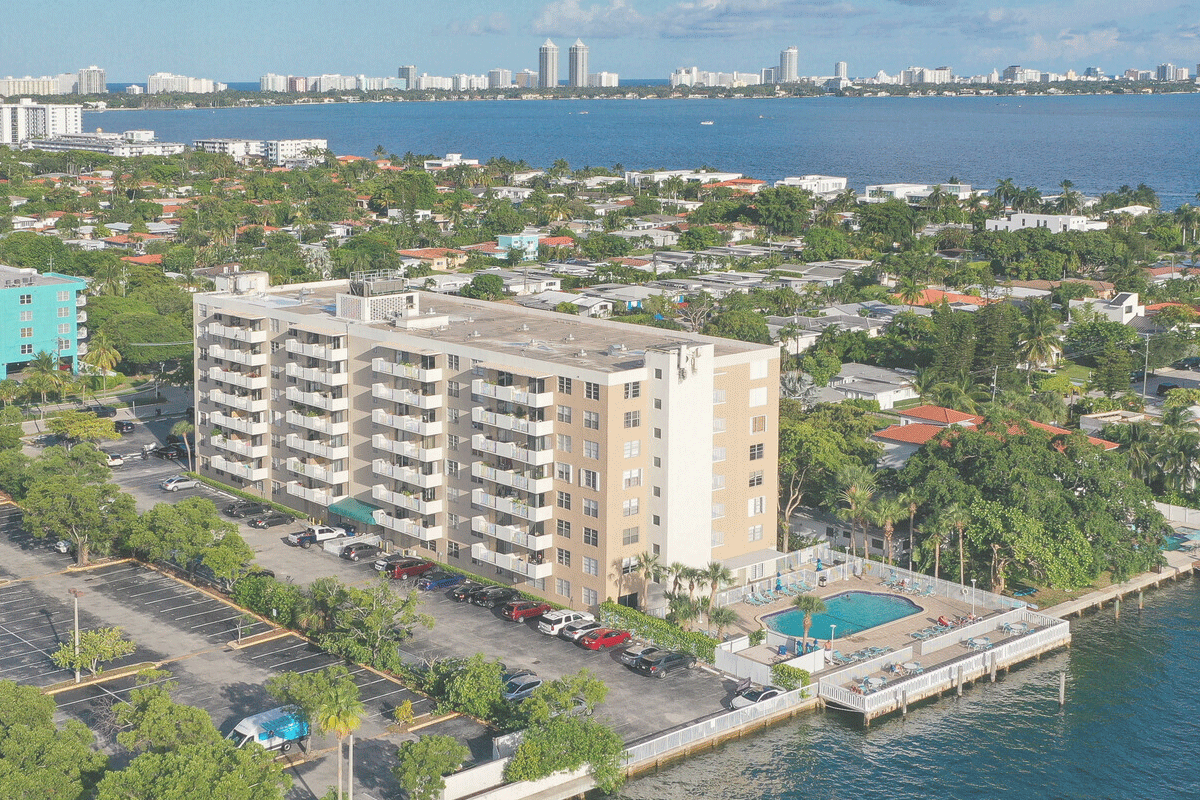 Aerial view of Island Place waterfront building with pool
